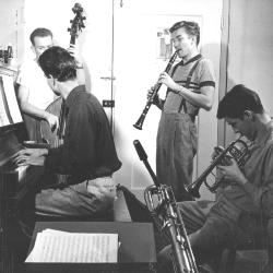 Dave Brubeck; Ron Crotty on bass, Bill Smith on clarinet, and Dick Collins on trumpet in rehearsal (San Francisco, California