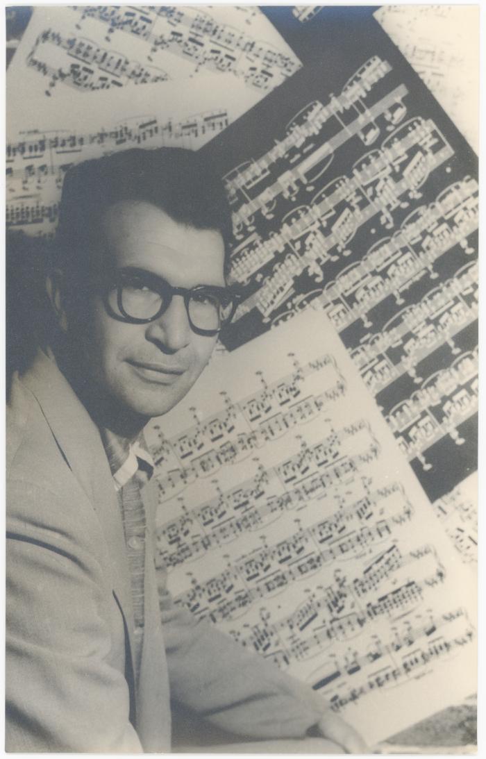 Dave Brubeck in profile against sheet music background  (New York City, New York)