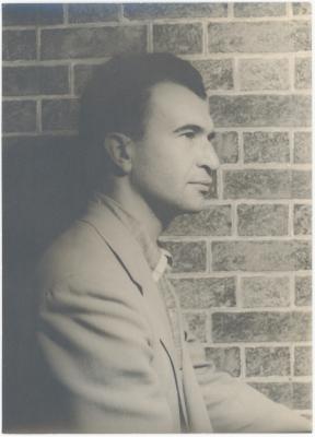 Dave Brubeck in profile against brick wall (New York City, New York)