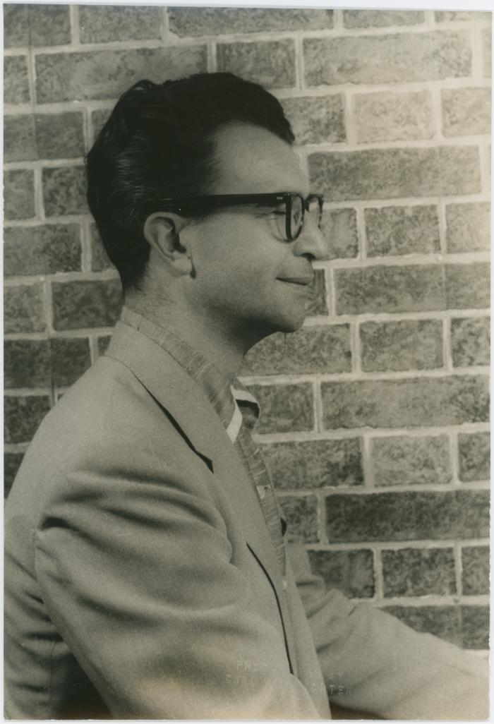 Dave Brubeck in profile against brick wall (New York City, New York)