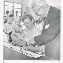 Mrs. Jane Findley of El Cerrito and Chuck Dutton at the paper keyboard while class watches during a "Dave teaches teachers" session for Alameda County school teachers (California)