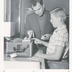 Dave Brubeck and Dickie Roberts preparing tape recorder during a "Dave teaches teachers" session for Alameda County school teachers (California)