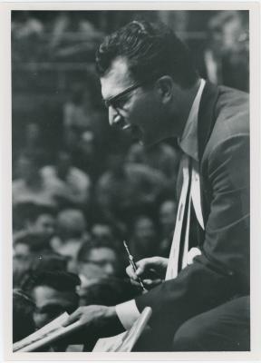 Dave Brubeck (pen in hand), audience in background (Gainesville, Florida [?])