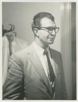 Dave Brubeck in front of a coat rack (Newcastle, United Kingdom)