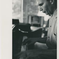 Dave Brubeck at piano in home #1 -- (Oakland, California) (8x10; credit: Bethlehem Pacific)