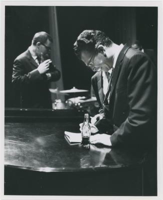 Dave Brubeck with Coca Cola bottle, Joe Morello in background (Milwaukee, Wisconsin)