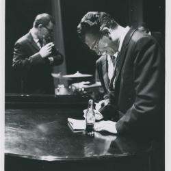 Dave Brubeck with Coca Cola bottle, Joe Morello in background (Milwaukee, Wisconsin)