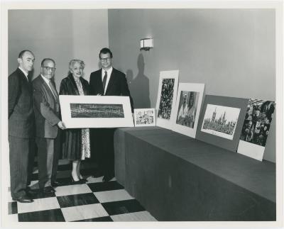 Dave Brubeck, two unidentified men and unidentified woman at exhibit (San Francisco, California)