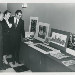 Dave Brubeck and Iola Brubeck with unidentified man at exhibit (San Francisco, California)