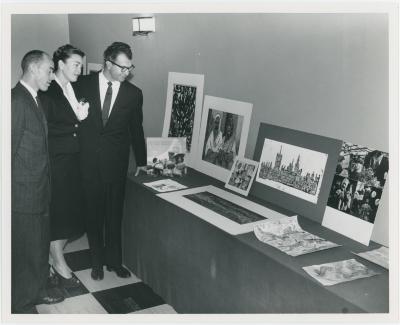 Dave Brubeck and Iola Brubeck with unidentified man at exhibit (San Francisco, California)