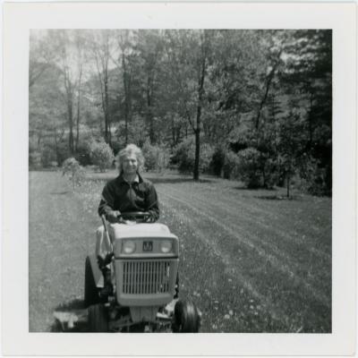 Dave Brubeck on a riding lawnmower mowing his lawn (Wilton, Connecticut)