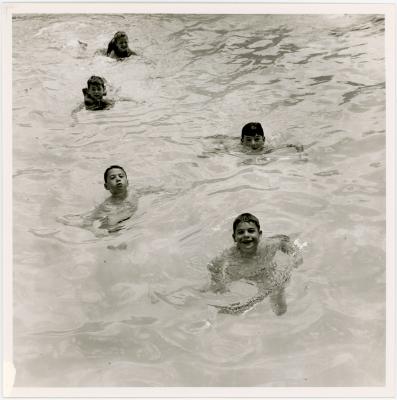 Dave Brubeck, Chris Brubeck, Catherine Brubeck, Michael Brubeck, Darius Brubeck in swimming pool at Irving Townsend house (Wilton, Connecticut)