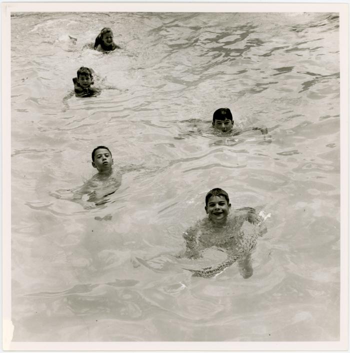 Dave Brubeck, Chris Brubeck, Catherine Brubeck, Michael Brubeck, Darius Brubeck in swimming pool at Irving Townsend house (Wilton, Connecticut)