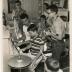 Dave Brubeck giving music lesson to Darius Brubeck, Michael Brubeck, Chris Brubeck, Dan Brubeck, with Iola Brubeck and Catherine Brubeck watching (Wilton, Connecticut)